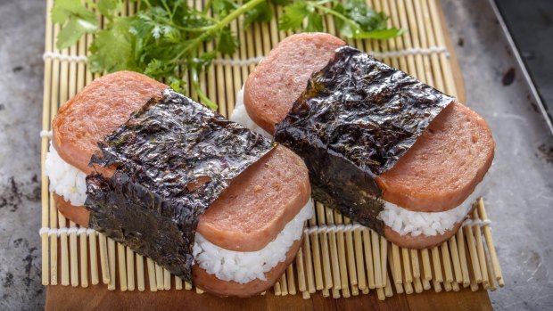 Spam musubi - a slice of Spam on a block of rice and wrapped in seaweed – is a much-loved 'delicacy' in which US state?