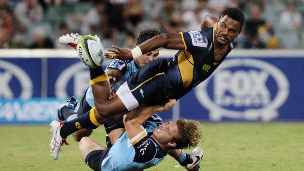 Henry Speight gets the ball away against the Waratahs.