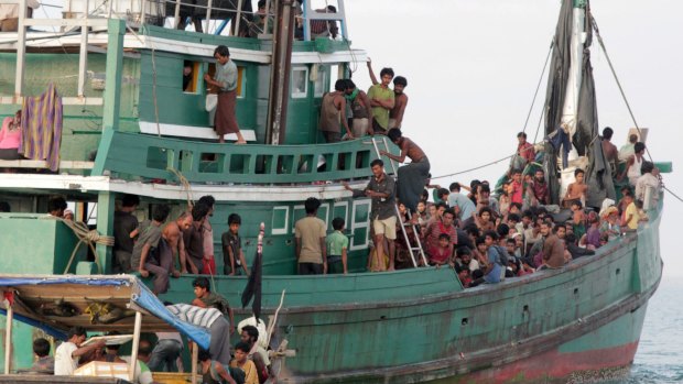 Rohingya and Bangladeshi refugees await rescue by Acehnese fishermen off East Aceh, Indonesia, in May 2015.