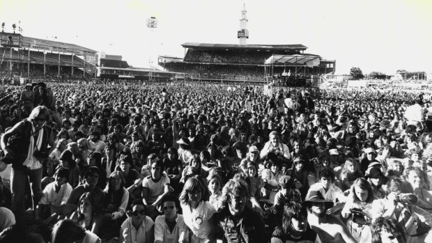 For more than seven hours they sat on the grass and perched in the stands, many bare-chested and basking in the ideal summer conditions.