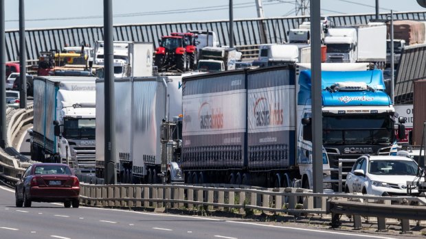 Heavy truck traffic on the West Gate Bridge.