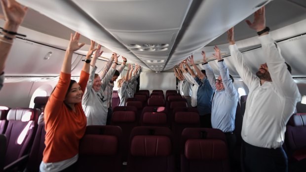 Passengers do exercises on board to help combat jet lag.