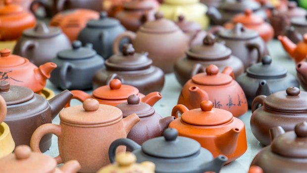 Tea pots for sale at a Hong Kong market. Hong Kong has resolutely clung on to its tea-drinking heritage.
