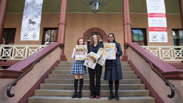 Ten-year-old Grace Gregson from year 5 at Seaforth Public School, <i>Crinkling News</i> founder and editor Saffron Howden, and 15-year-old Diya Mehta from year 10 at MLC, outside NSW Parliament House after speaking at the Senate media inquiry.