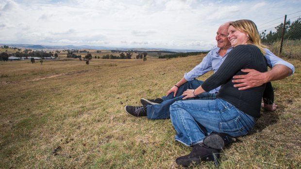 Leigh Allison and Michael Friedrich look over the Uriarra and the land that was to become a solar farm.