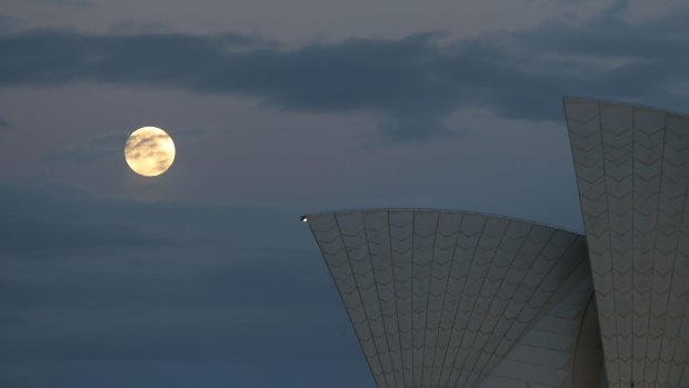 Supermoon illuminates the Sydney Opera house.