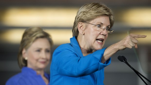 Democrat senator Elizabeth Warren joins Hillary Clinton on the campaign trail to deliver a withering attack on Donald Trump.
