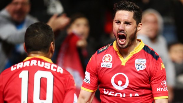 Three to the good... Dylan McGowan of Adelaide is pumped up after putting his side 3-1 up against Melbourne City.