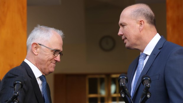 Prime Minister Malcolm Turnbull on Tuesday with Immigration Minister Peter Dutton, who will take on the Home Affairs portfolio.