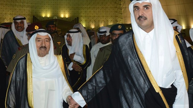 Qatar's ruler Sheikh Tamim bin Hamad al-Thani, right, with Kuwaiti leader  Sheikh Sabah al-Ahmad al-Sabah, who is mediating between Qatar and its accusers.
