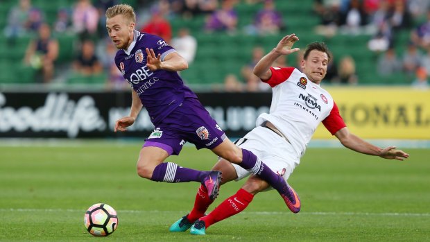 No apologies: Brendon Santalab received a yellow card for a foul on Perth's Joseph Mills but some believed the Wanderers player should have been shown a straight red card.