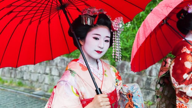 Geishas have been mobbed by tourists trying to get photos of them in Kyoto.