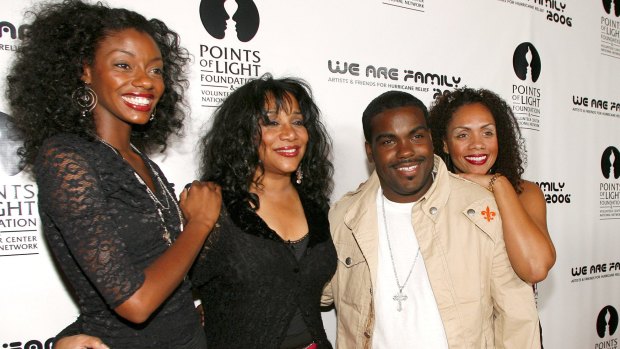 Joni Sledge, one of the original members of "Sister Sledge," second from left, with music producer Rodney Jerkins, her niece Camille Sledge, left, and her cousin Amber Sledge, 2006. 
