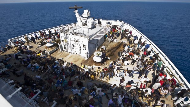 Rescued migrants safely on board HMS Bulwark in the Mediterranean on Sunday.