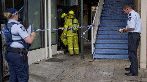 Fire crews and police investigate the fire at the Brierly Street cafe in Weston in March 2014.