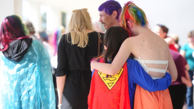 Friends and family dressed in bright colours and as superheroes for the funeral of Nikki Francis-Coslovich in Mildura on Tuesday.  
