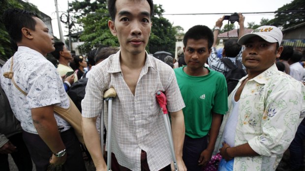 Released prisoners walk outside Insein Prison in Yangon on Thursday.