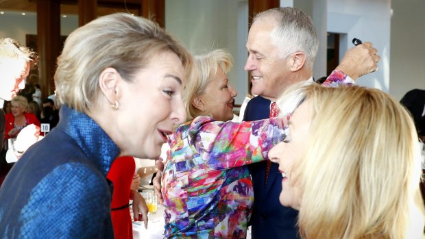 Prime Minister Malcolm Turnbull greets Australia's Ambassador for Women and Girls Sharman Stone during the International Women's Day breakfast in February.