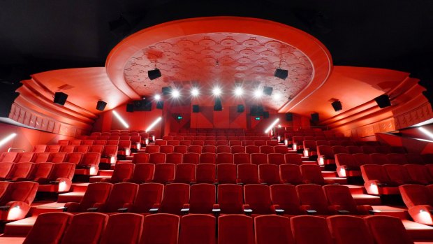 The "red" theatre, one of eight colour-coded screening rooms in the Lido Cinemas revamp by ITN Architects.