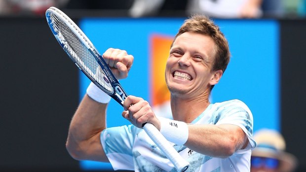 Finally: Tomas Berdych celebrates his first victory over Rafael Nadal in nine years in the men's singles quarter-finals at the Australian Open. 