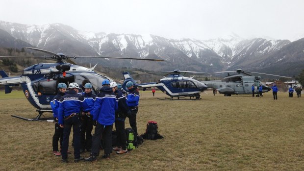 Gendarmerie and French mountain rescue teams arrive near the site of the Germanwings plane crash near the French Alps.