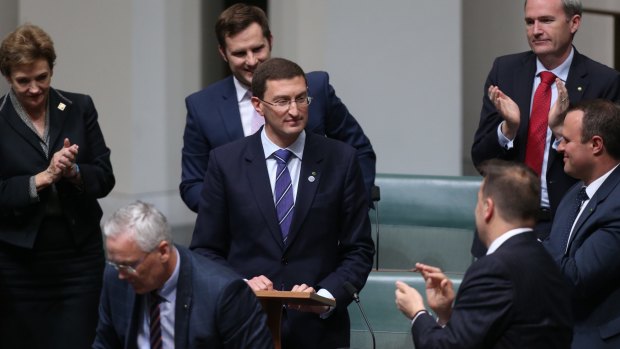 Mr Leeser is congratulated by other MPs after delivering his first speech.