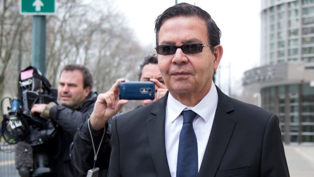 Rafael Callejas, former president of Honduras, leaves court in Brooklyn, New York, on Monday after admitting conspiracy charges.