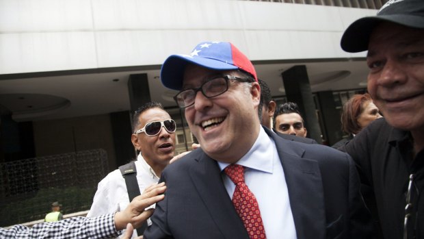 Julio Borges of the First Justice Party, arrives at the National Assembly in Caracas, Venezuela, on Tuesday.