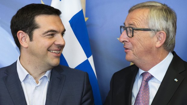 Greek Prime Minister Alexis Tsipras, left, is welcomed by European Commission president Jean-Claude Juncker ahead of last-ditch negotiations.
