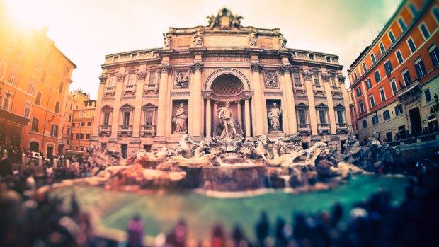 Popular sights such as the Trevi Fountain, Rome, attract tourists and selfie-takers.