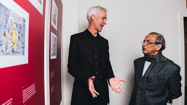 David Pope with Indian artist Ajit Ninan, cartoonist to the world's largest democracy, at Ninan's 2016 exhibition at the Museum of Australian Democracy at Old Parliament House in Canberra.