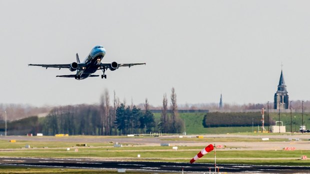 A Brussels Airlines plane takes off at Brussels Airport, in Zaventem, Belgium, on Sunday under extra security.