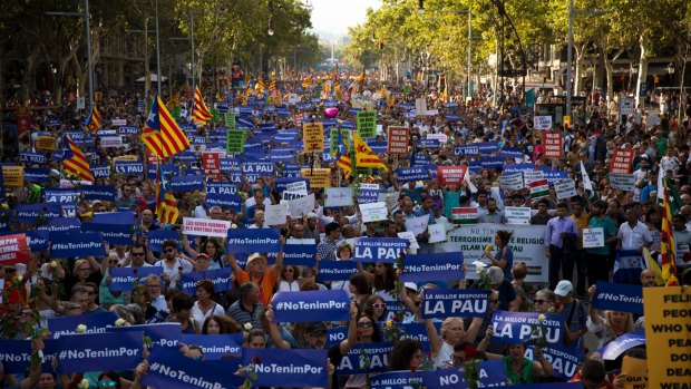 The demonstration in Barcelona condemned the attacks that killed 15 people.