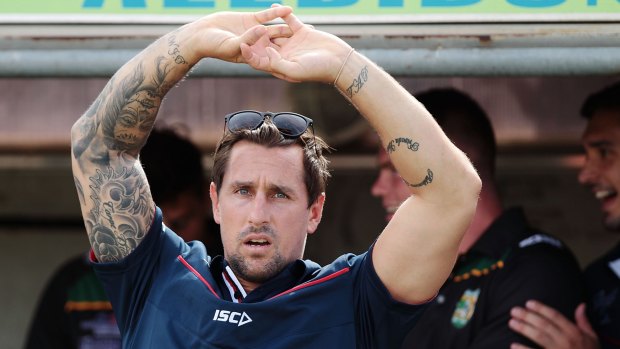 Rooster in the spotlight: Mitchell Pearce watches on during the match between his Roosters and the Canberra Raiders.