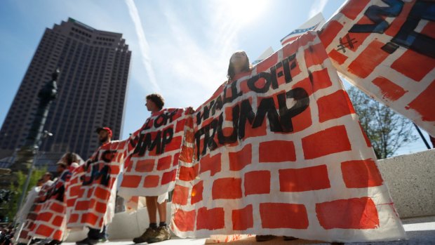Activists protested at the Republican convention in Cleveland over Donald Trump's plans for a wall along the US-Mexican border.