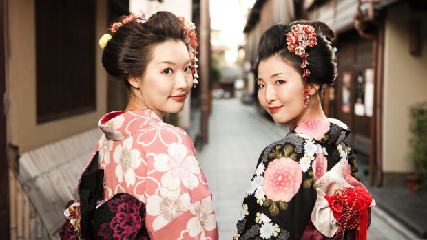See traditionally dressed geisha's in the the Higashiyama district of Kyoto.