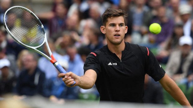 Young star on the rise: Dominic Thiem returns a shot to Roger Federer.