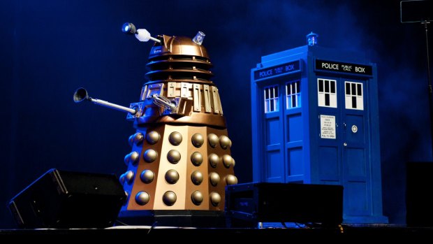 A Dalek and Dr Who's TARDIS time machine share centre stage in the Dr Who Symphonic Spectacular.