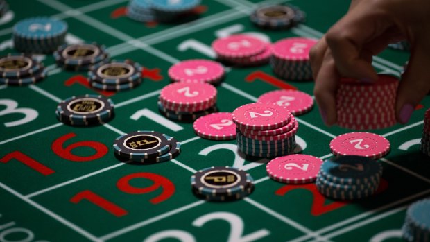 Why are some of us drawn to casinos, even though we know winning is unlikely?