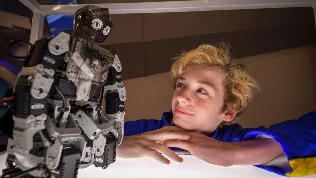 Year 8 students Seb Abbott from Lilydale Heights College and the robot he constructed. 