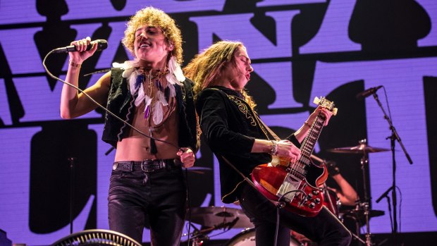 Josh Kiszka, left, and Jake Kiszka of Greta Van Fleet on stage in California in December 2018.