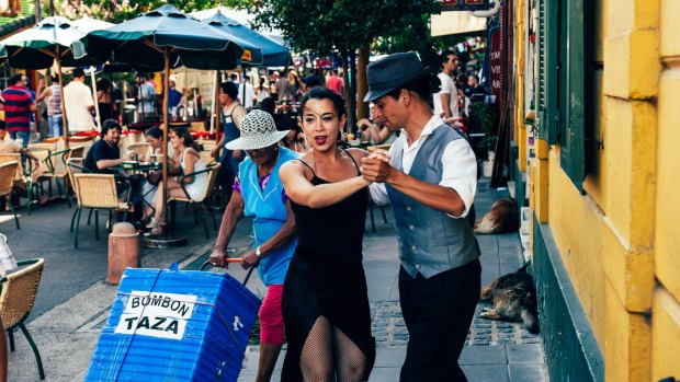 Tango dancers performing in the streets of Buenos Aires.