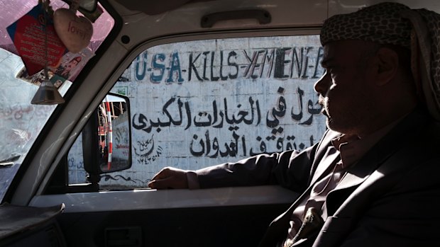 Anti-American graffiti on the street in Yemen's capital Sanaa.