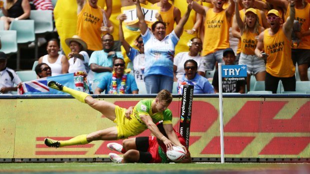Cameron Clark touches down for Australia during the Sydney Sevens.