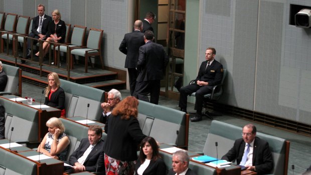 Short fuse: A group of Coalition MPs walk out of the chamber while Opposition Leader Bill Shorten delivers a Closing the Gap statement.