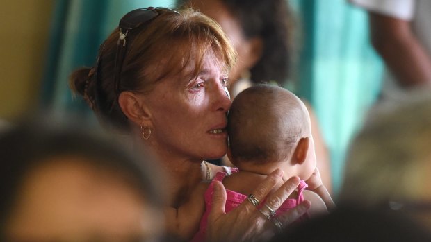 An interfaith service to mourn the eight children killed in a home in the Cairns suburb of Manoora.