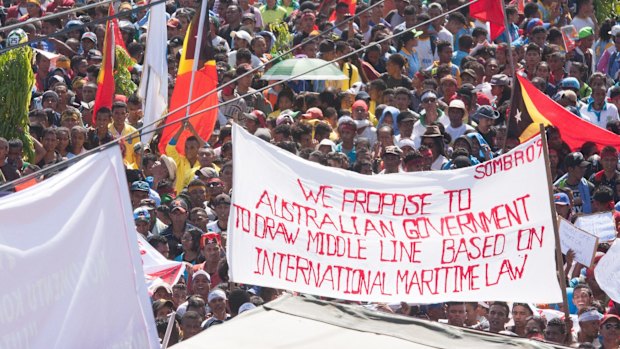 At least 10,000 people protest in Dili last year against Australia's stance on the oil and gas meridian line in the Timor Sea. 