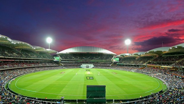 The sun sets over the historic day-night Test at Adelaide Oval on Friday evening. 