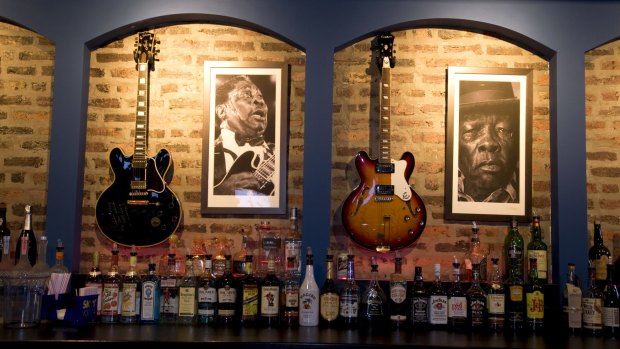 Music legends on the wall at Buddy Guy Legends in Chicago.