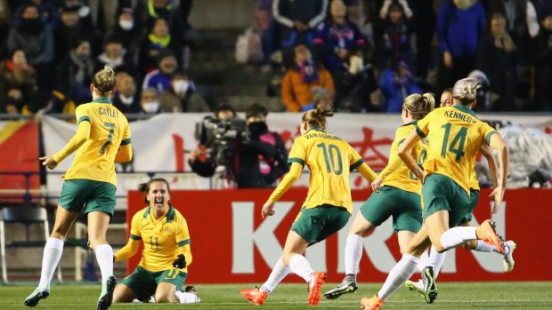 Dream start: The Matildas started the Olympic qualifying tournament with a stirring win over Japan.